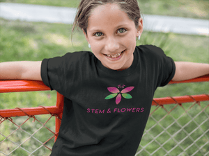 Girl wearing STEM and Flowers logo t-shirt